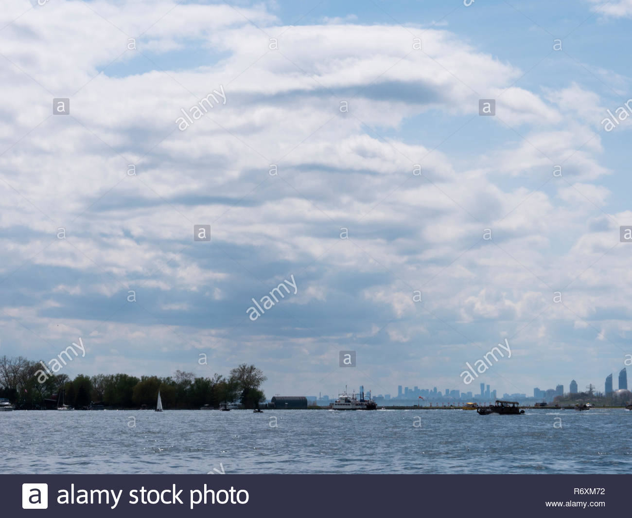 Cloudy dramatic aerial view of Billy Bishop Toronto City Airport