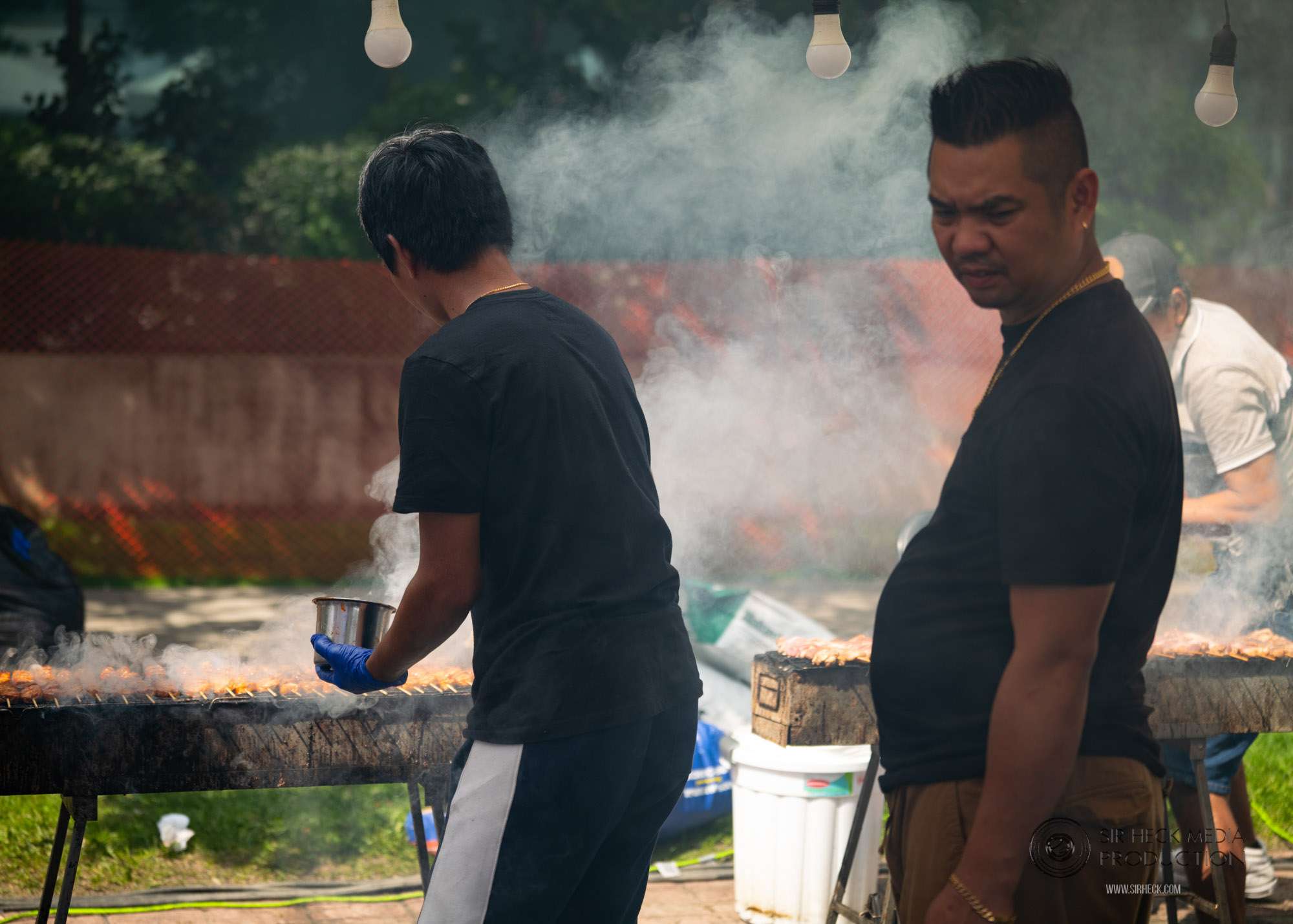 Vendor serving traditional Filipino dishes